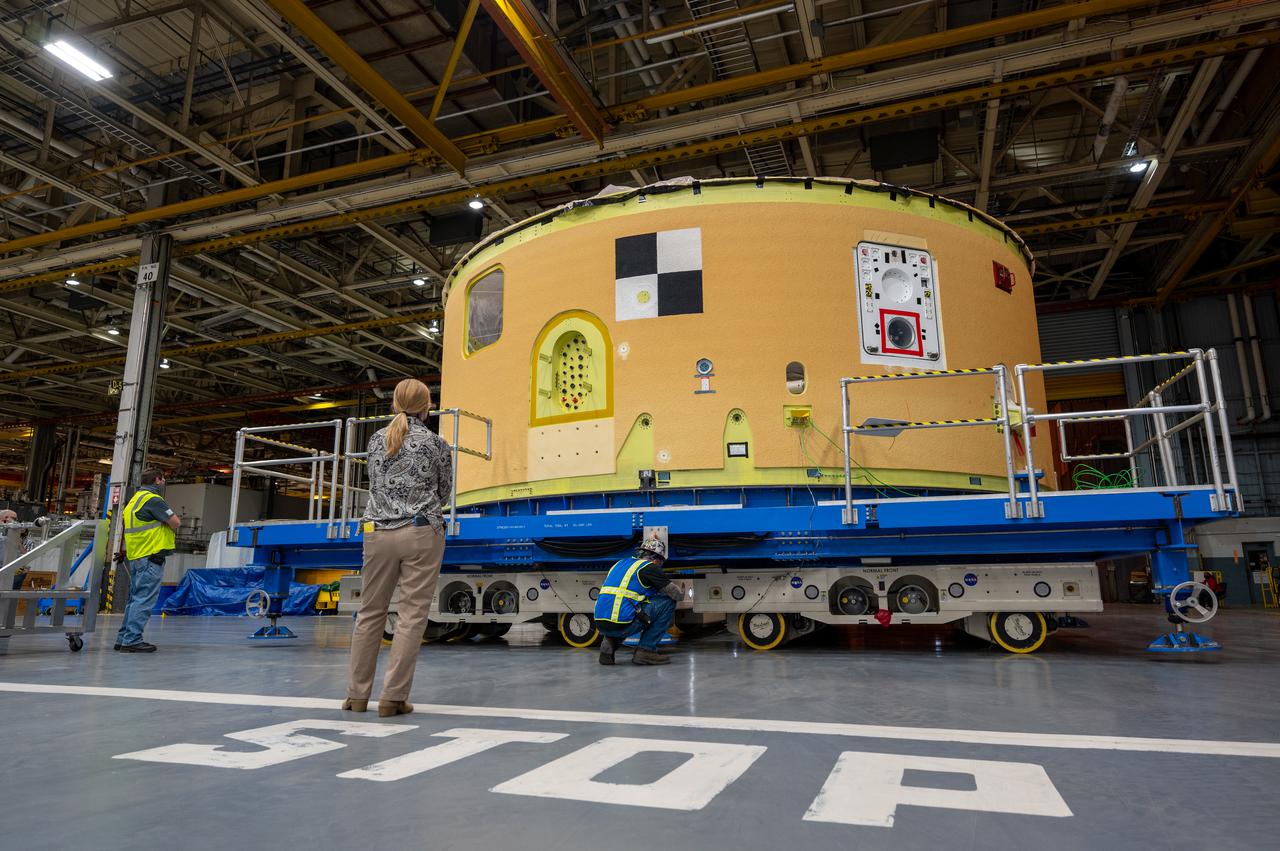This image shows the forward skirt that will be used on the core stage of NASA’s Space Launch System rocket for Artemis II, the first crewed mission of NASA’s Artemis program, at NASA’s Michoud Assembly Facility. The SLS core stage is made up of five unique elements: the forward skirt, liquid oxygen tank, intertank, liquid hydrogen tank, and the engine section. The forward skirt houses flight computers, cameras, and avionics systems. The hardware is located at the top of the 212-foot-tall core stage and connects the upper part of the rocket to the core stage. Soon, technicians will ready the forward skirt for the first of three core stage assembly mates called the forward join. The forward join consists of three main parts -- the forward skirt, liquid oxygen tank, and intertank – to create the top, or forward part, of the core stage. Together with its four RS-25 engines, the rocket’s massive 212-foot-tall core stage — the largest stage NASA has ever built — and its twin solid rocket boosters will produce 8.8 million pounds of thrust to send NASA’s Orion spacecraft, astronauts and supplies beyond Earth’s orbit to the Moon and, ultimately, Mars. Offering more payload mass, volume capability and energy to speed missions through space, the SLS rocket, along with NASA’s Gateway in lunar orbit, the Human Landing System, and Orion spacecraft, is part of NASA’s backbone for deep space exploration and the Artemis lunar program. No other rocket is capable of carrying astronauts in Orion around the Moon in a single mission.